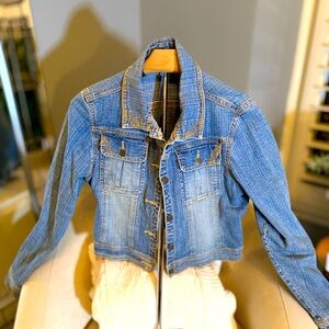 Women’s jean jacket distressed size 8.
